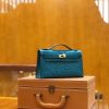 00dae71e8ff66b2.jpg 爱马仕 mini kelly 22cm 孔雀蓝 进口kk鸵鸟皮 蜡线 全手工缝制
