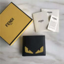 FENDI 芬迪 0170 升级版小怪兽平纹皮短款二折钱包 黑色黄眼