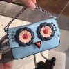 203 FENDI 芬迪 小怪兽带脚包 拼色花朵铆钉 链条手提肩包 天蓝色
