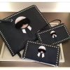 FENDI 0363克公仔 芬迪手拿包 老佛爷造型 芬迪钱包 黑色