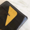 0363 FENDI 芬迪 小怪兽眼睛 全蛇皮 拉链手拿包 黑色
