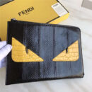 0363 FENDI 芬迪 小怪兽眼睛 全蛇皮 拉链手拿包 黑色