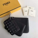 616 FENDI芬迪 F IS FEND 三套索环 铆钉手拿包 黑色