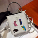 1BA217 Prada女包 Prada Panier 珐琅金属贴花 Saffiano皮革 Prada手袋 白色