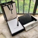 475317 Gucci GG Marmont系列皮革手拿包 蜜蜂金属配件手包 黑色