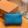 2570c89291e14b1.jpg 爱马仕 mini kelly 22cm 孔雀蓝 进口kk鸵鸟皮 蜡线 全手工缝制
