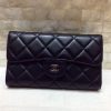CHANEL 原单进口羊皮三折钱夹 A31506黑色/银扣