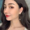 20CHANEL香奈儿黑皮绳双c耳钉耳环