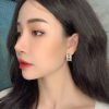 20CHANEL香奈儿金色字母镂空耳钉耳环
