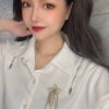 CHANEL香奈儿双c五角星流苏胸针