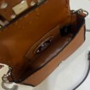 Fendi 小型 First 包，Fendace 巴洛克面料，金色