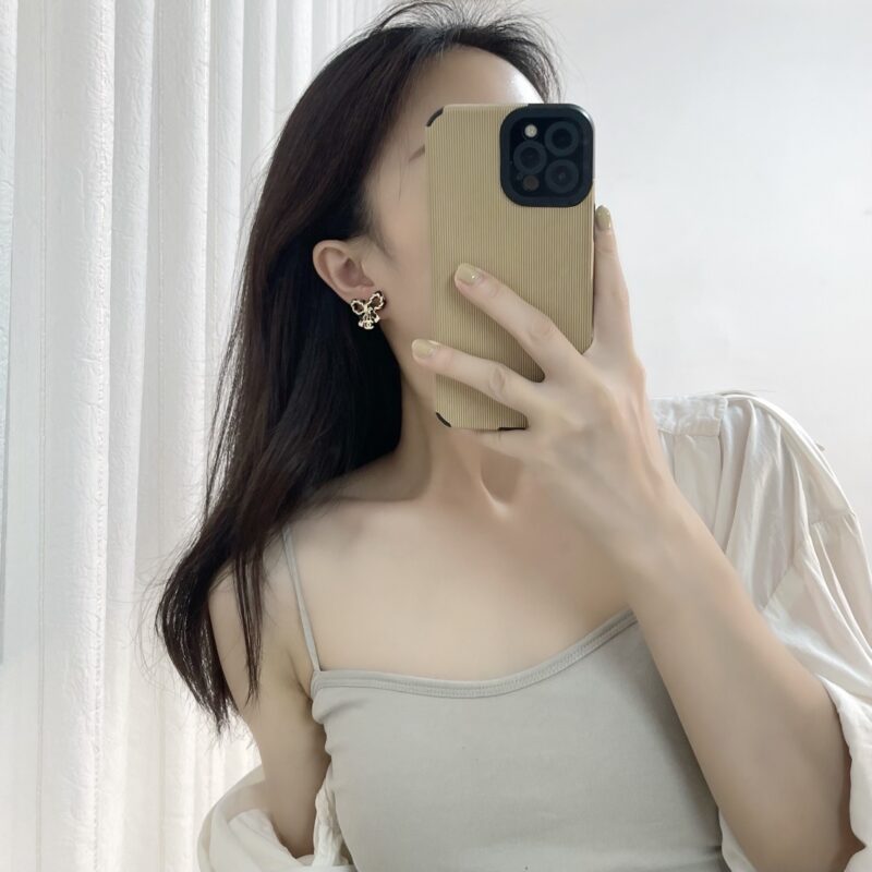 ☑️CHANEL香奈儿双c 黑皮绳蝴蝶结耳钉耳环 - Image 5