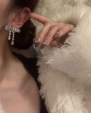 MIU MIU缪缪蝴蝶结流苏耳钉耳环