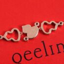 Qeelin麒麟镂空满钻红玛瑙孔雀石手链