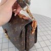 LV POCHETTE MéTIS