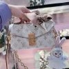 LV POCHETTE MéTIS EAST WEST